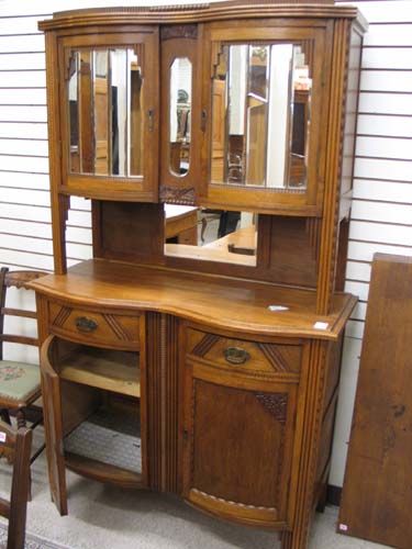 Appraisal: AN ART DECO OAK KITCHEN CABINET Belgian c in two