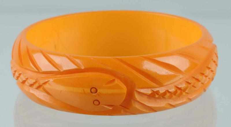 Appraisal: Bakelite Carved Bracelet with Snake Description CORRECTION Bracelet is butterscotch