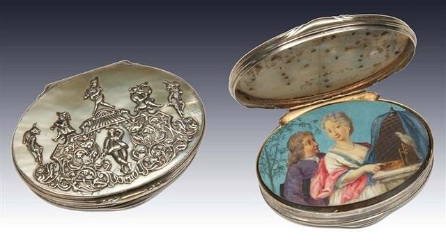 Appraisal: A CONTINENTAL OVAL SNUFF BOX with inset mother of pearl