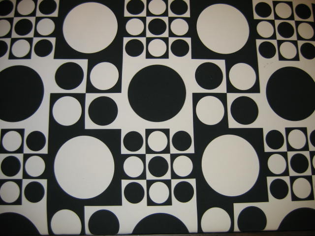 Appraisal: BLACK AND WHITE FABRIC PANEL repetitive pattern of dots on