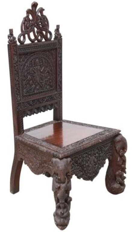 Appraisal: Burmese heavily carved hardwood figural chair late th early th