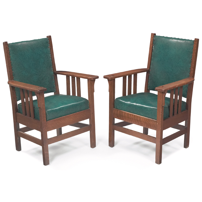 Appraisal: Arts and Crafts armchairs pair recovered back and seat with