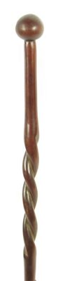 Appraisal: A Wenge wood cane with ovoid handle and part twist