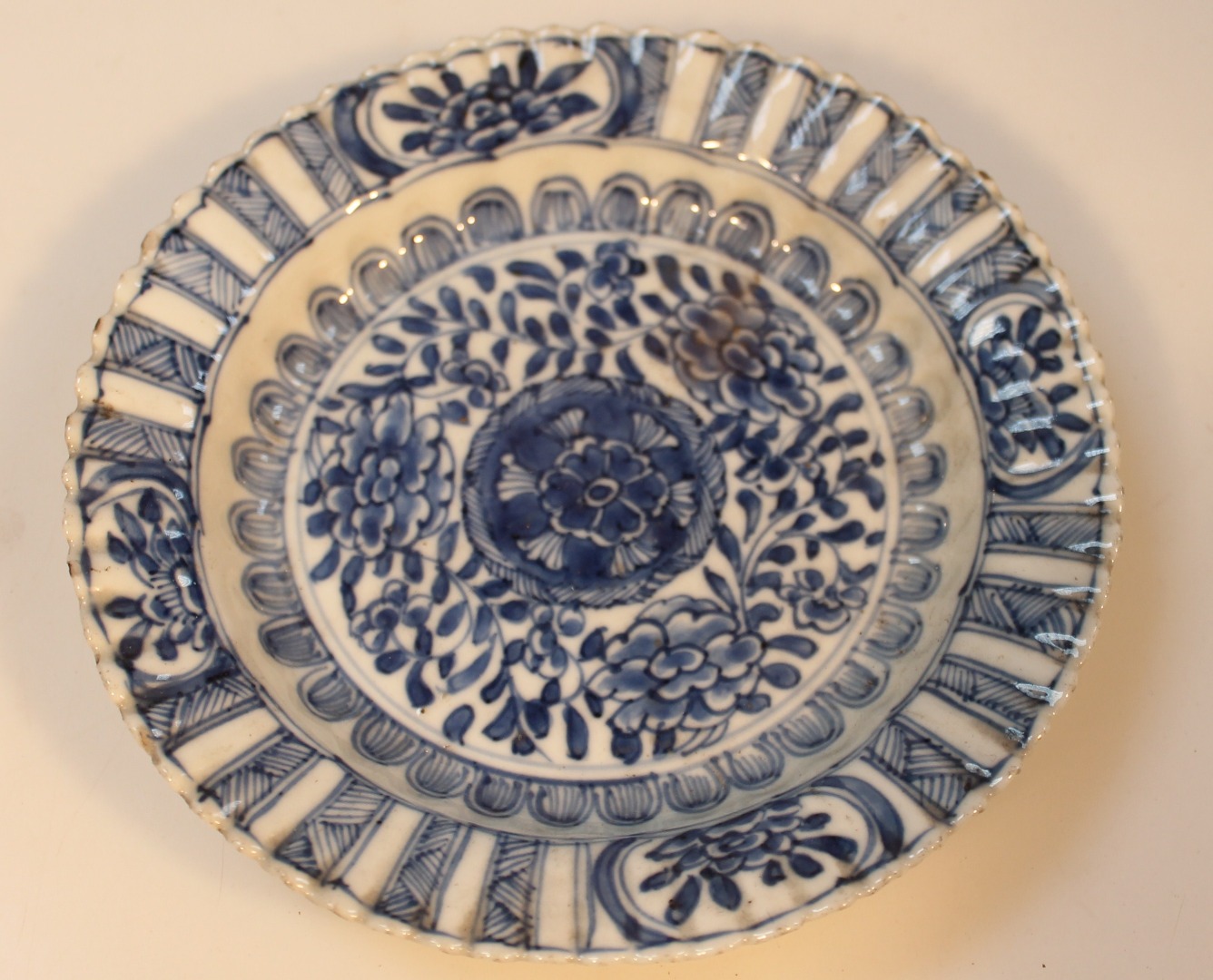 Appraisal: A Chinese porcelain blue and white saucer the floral centre