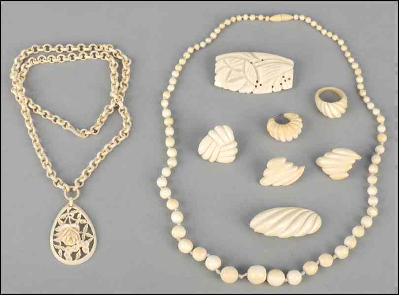 Appraisal: GROUP OF CARVED IVORY JEWELRY Comprised of two necklaces one