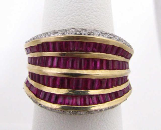 Appraisal: Lady's K yellow gold ruby and diamond ring with baguette