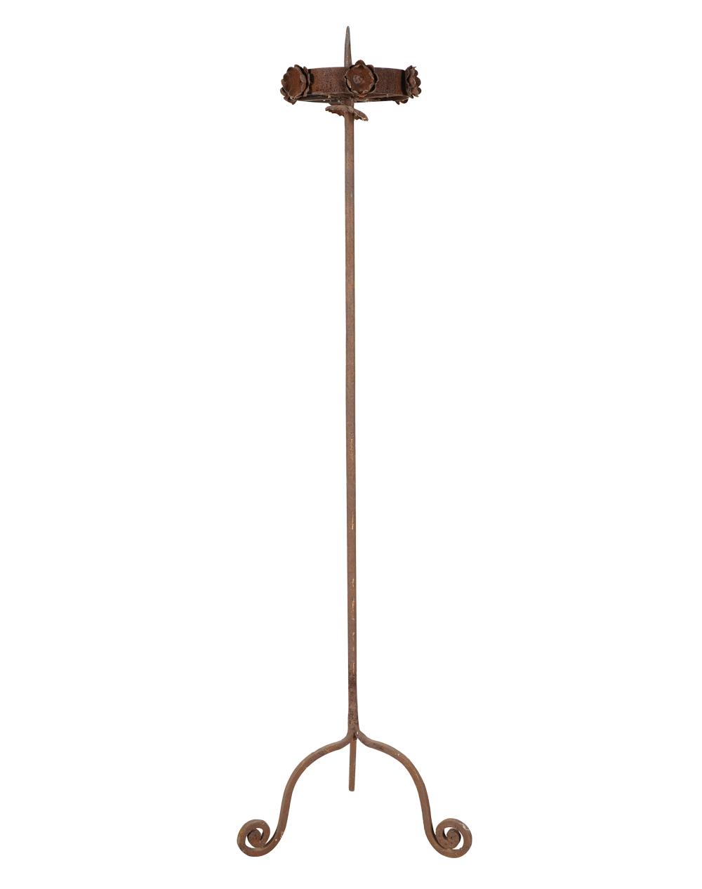 Appraisal: WROUGHT IRON PRICKET STICKon tripod base Condition heavy oxidation throughout