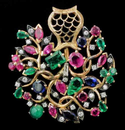 Appraisal: A s gold coloured metal mounted diamond ruby emerald and