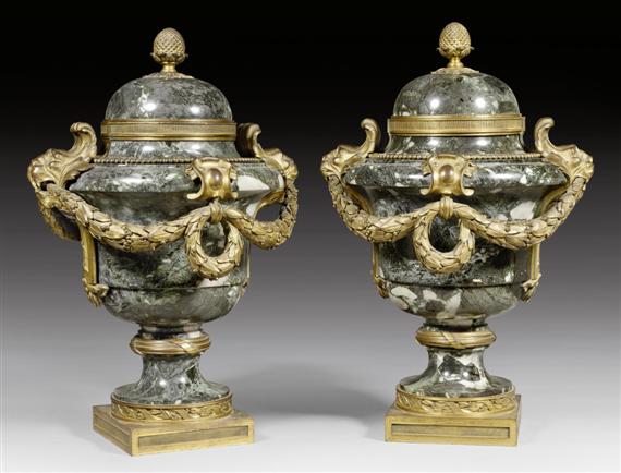 Appraisal: PAIR OF LIDDED VASES AUX TETES DE LIONS WITH BRONZE