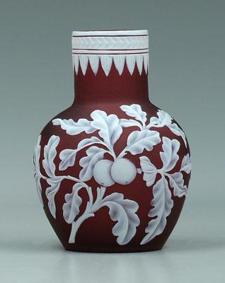 Appraisal: Cameo glass vase white floral and fruit decoration on dark