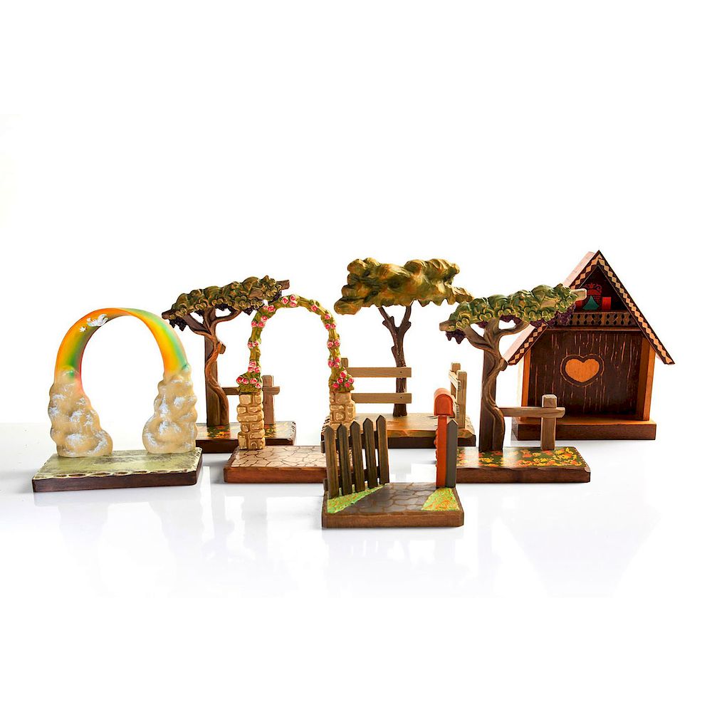 Appraisal: ANRI CARVED WOOD DISPLAY STANDS Outdoor themed display stands for