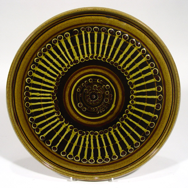 Appraisal: Poole pottery Guy Sydenham charger with green and brown trailed