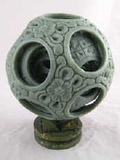 Appraisal: A large soapstone puzzle ball of seven concentric balls cm