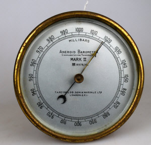 Appraisal: A lacquered brass Aneroid Barometer Mark no by T A