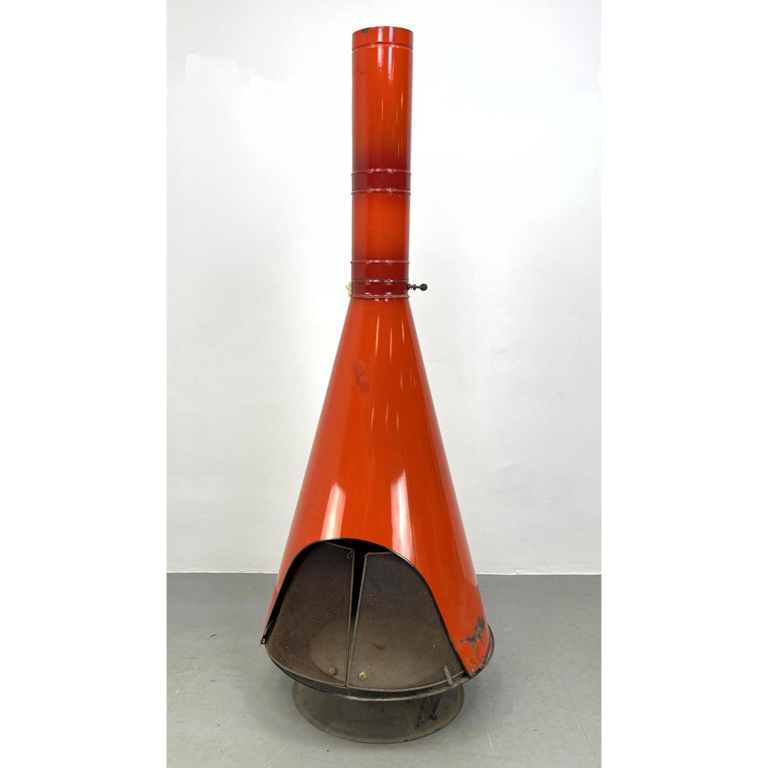 Appraisal: Preway Orange enamel wood burning fireplace stove Cone form Mid