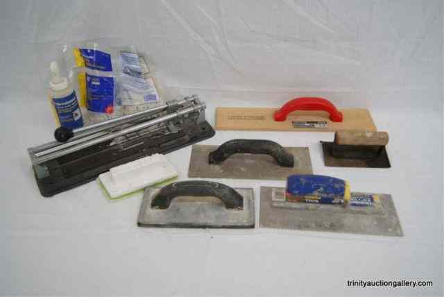 Appraisal: Ceramic Tile Cutter Tile TrowelsFrom the estate is a group