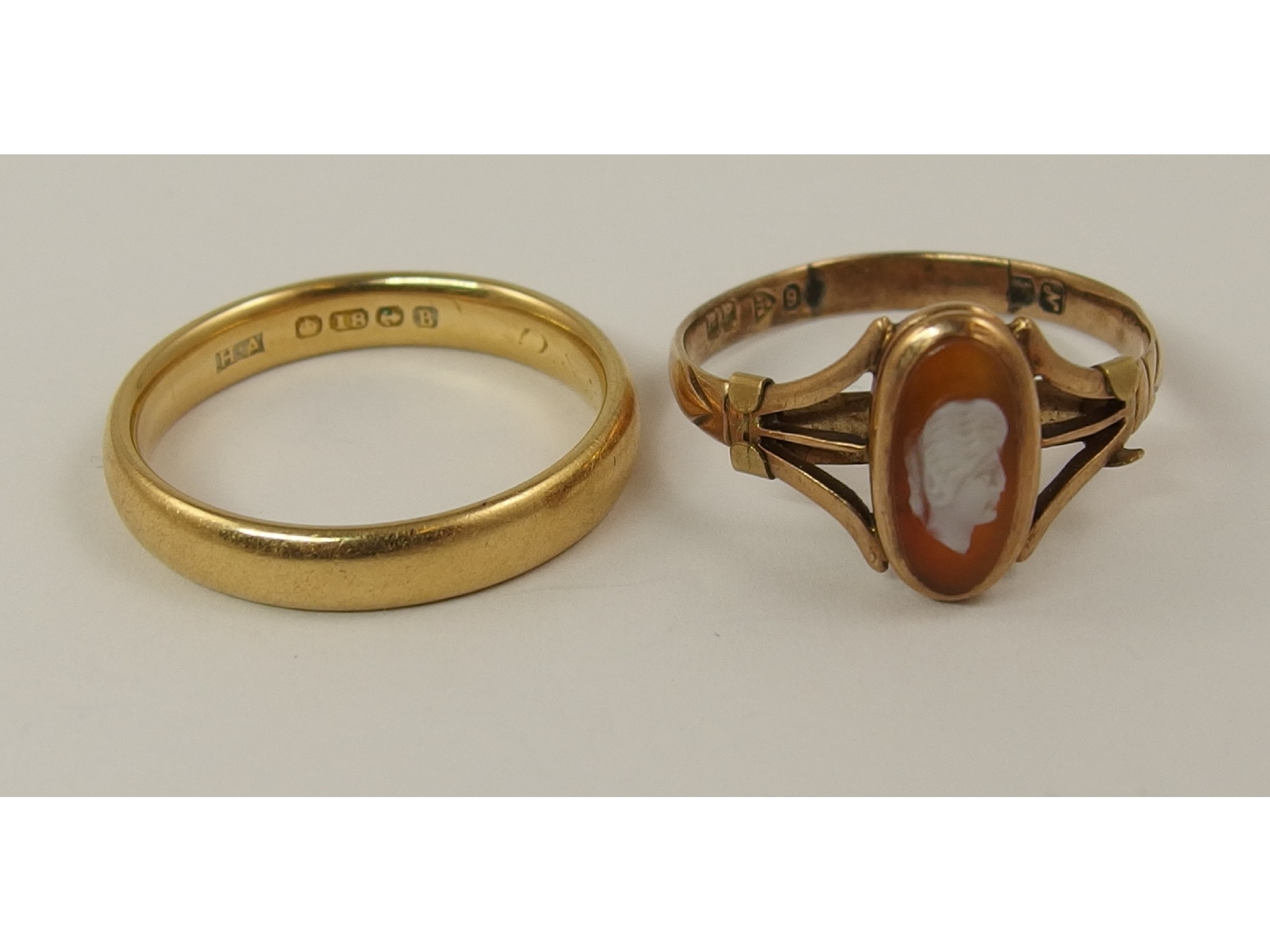 Appraisal: An ct wedding band and a ct cameo ring