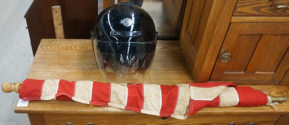 Appraisal: HARLEY-DAVIDSON MOTORCYCLE HELMET AND AN AMERICAN FLAGHarley-Davidson Motorcycle Helmet and