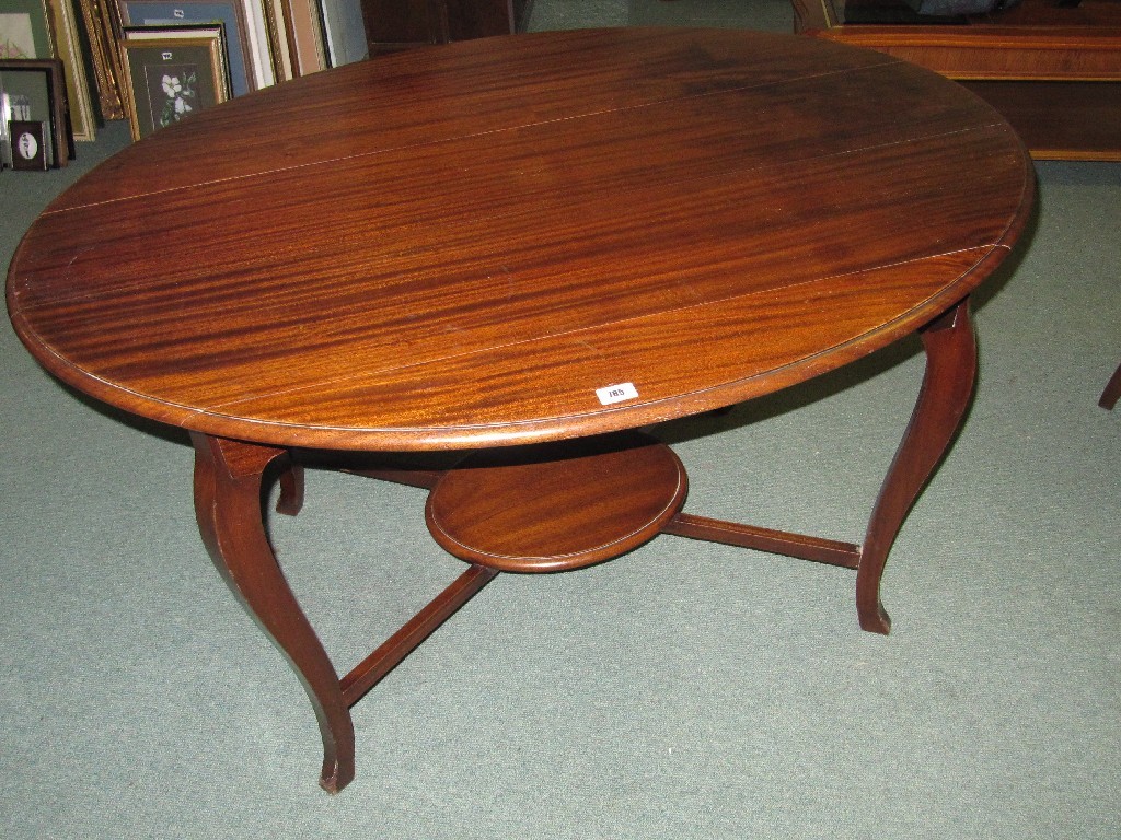 Appraisal: Mahogany oval two tier coffee table