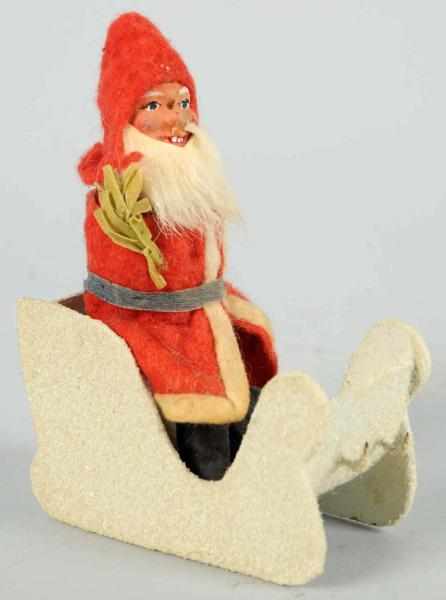 Appraisal: Santa in Sleigh Candy Container Japanese Head separates to expose