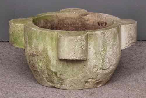 Appraisal: A heavy white marble circular mortar with four semi-circular lugs