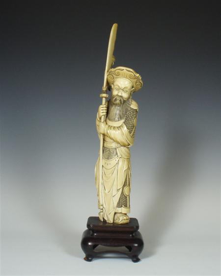 Appraisal: A Japanese ivory figure of a warrior Meiji period standing