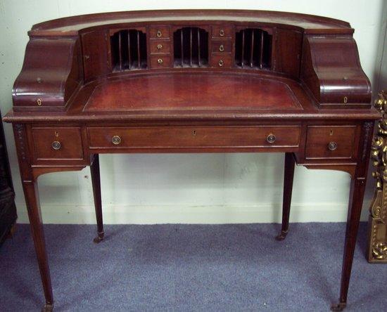 Appraisal: A mahogany Carlton House style table the superstructure with drawers