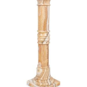 Appraisal: An Onyx Pedestal Base th Century with printed Hecho en