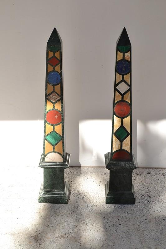 Appraisal: A PAIR OF COLOURED MARBLE OBELISKS A PAIR OF COLOURED