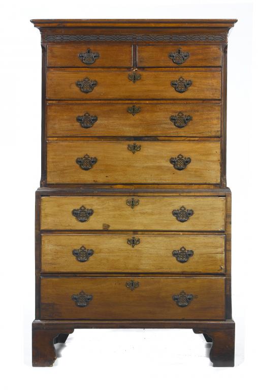 Appraisal: A GEORGE III MAHOGANY CHEST-ON-CHEST with cavetto cornice and blind