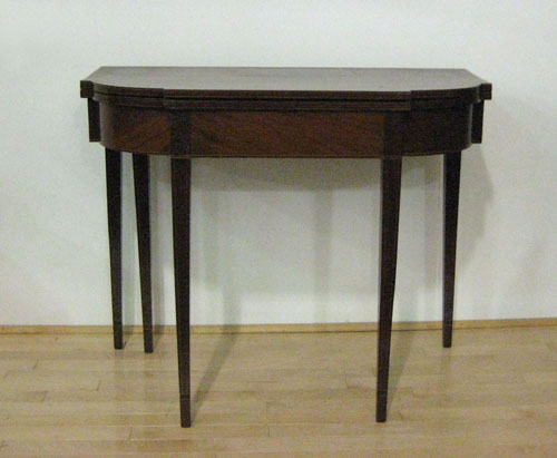 Appraisal: Hepplewhite mahogany card table ca with a shaped top over