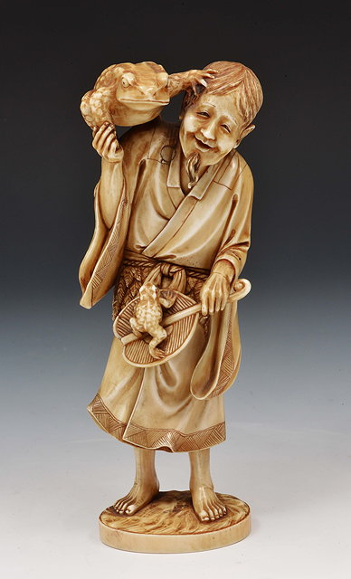 Appraisal: A Japanese ivory okimono of Sennin GamaMeiji periodsigned Ryokoku the