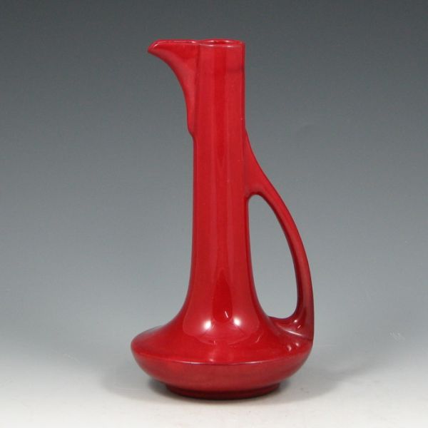 Appraisal: Roseville Mongol ewer in deep red gloss A period paper