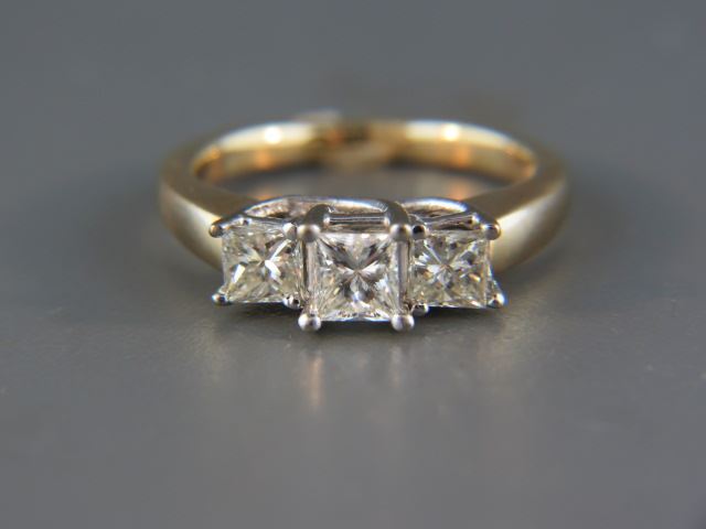 Appraisal: Diamond Ring a trio of square diamonds totaling carats k