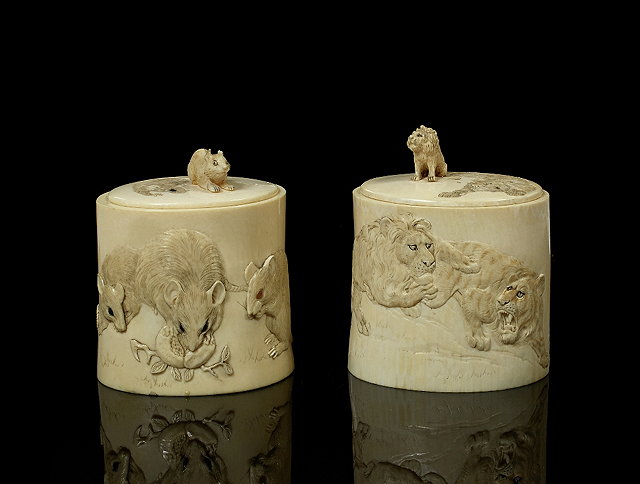 Appraisal: A pair of Japanese ivory tusk boxesMeiji period - carved