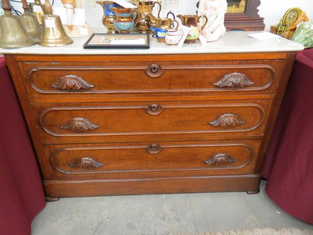 Appraisal: Marble Top Dresser triple drawer with carved pulls th century