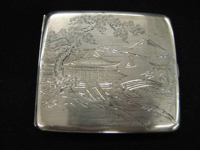 Appraisal: Japanese Sterling Silver Cigarette Case elaborate village scene Mt Fuji