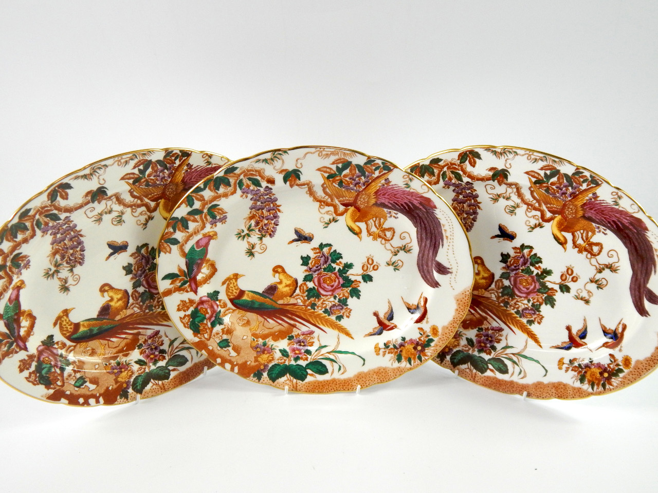 Appraisal: Three oval Royal Crown Derby porcelain meat platters decorated in