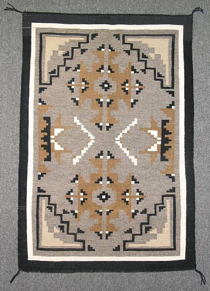 Appraisal: A Navajo Two Grey Hills rug size approximately ft in