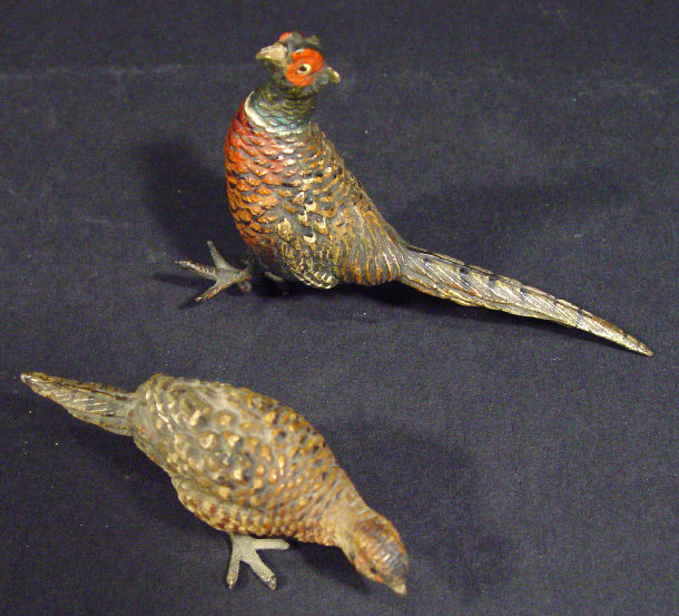 Appraisal: Two th Century cold painted bronze game birds the largest