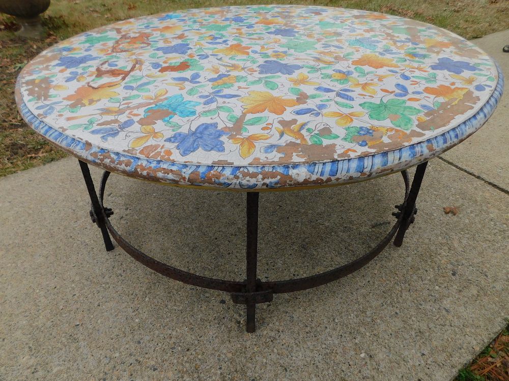 Appraisal: OUTDOOR IRON TABLE Heavy outdoor round iron table with concrete