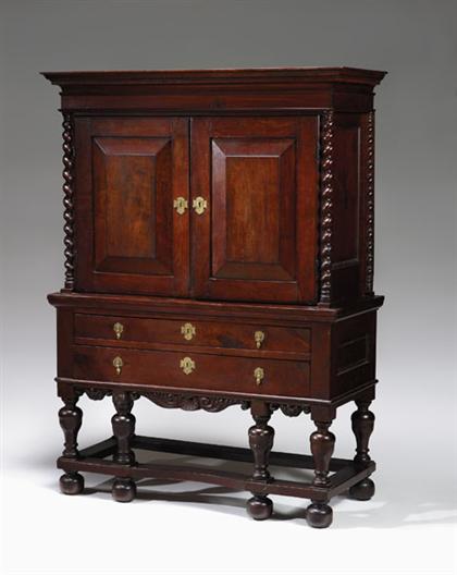 Appraisal: English walnut cabinet on stand th century and later In