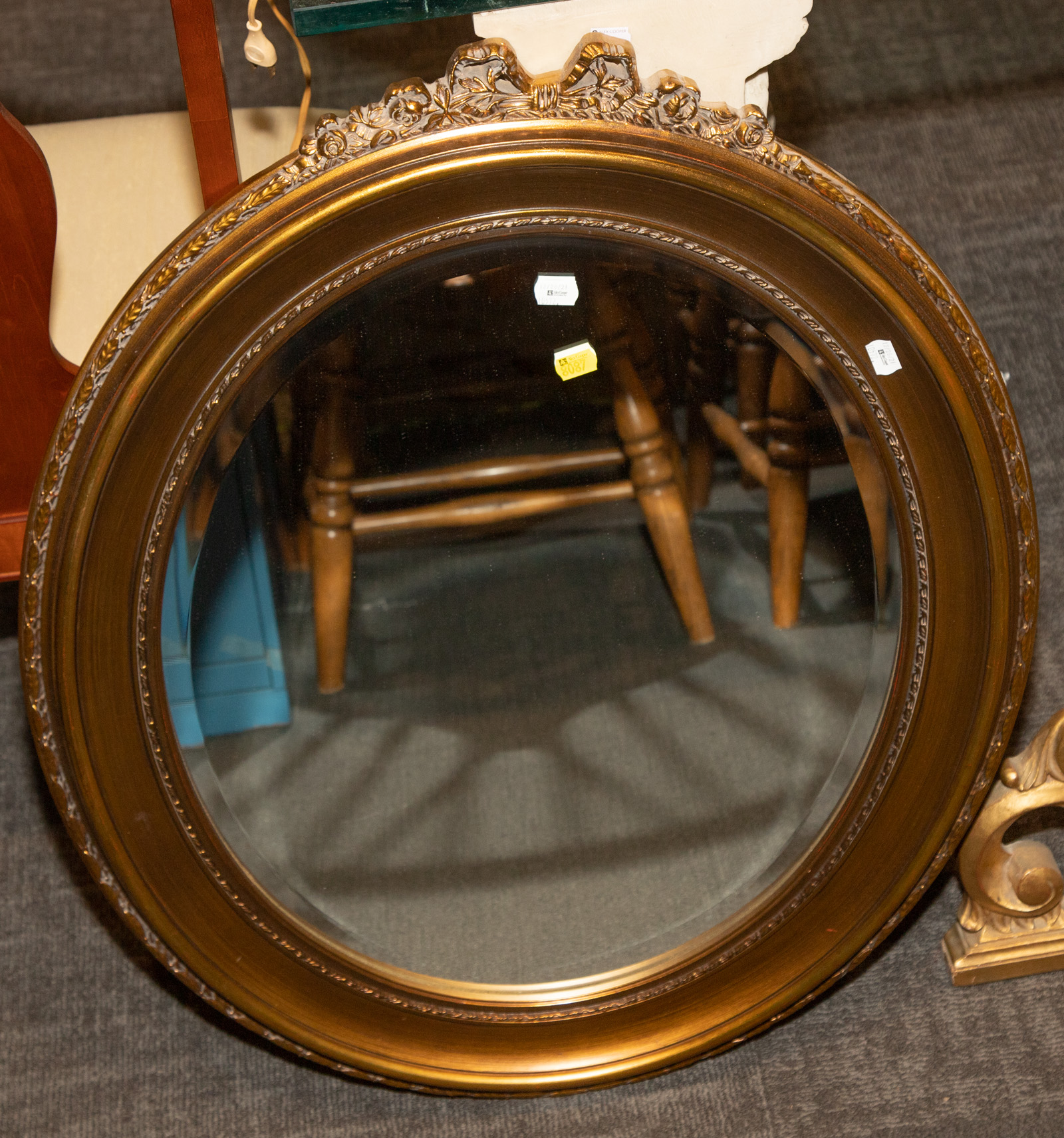 Appraisal: ROUND MIRROR Modern in gilt composition frame