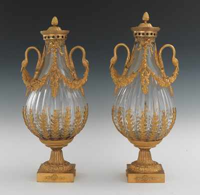 Appraisal: A Pair of Large Cut Crystal Ormolu Mounted Urns Each