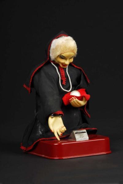 Appraisal: Tin Gypsy Fortune Teller Battery-Operated Toy Description Japanese Working Includes