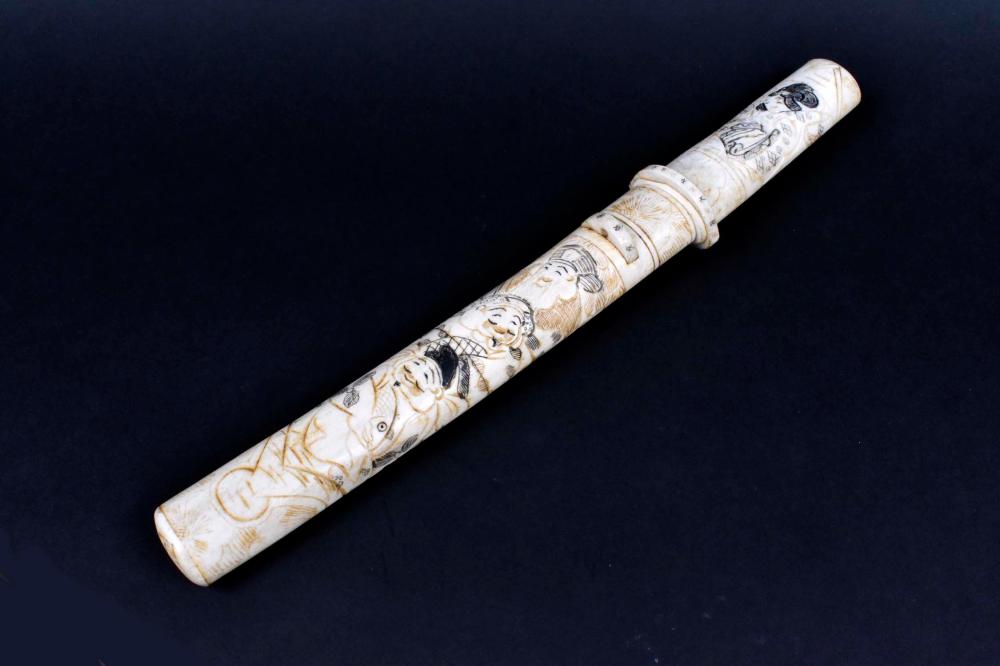 Appraisal: JAPANESE CARVED BONE DAGGERThe handle and sheath carved with multiple