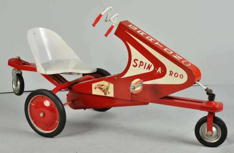 Appraisal: Pressed Steel Garton Spin-A-Roo Ride-On Toy Description Late s Manufactured