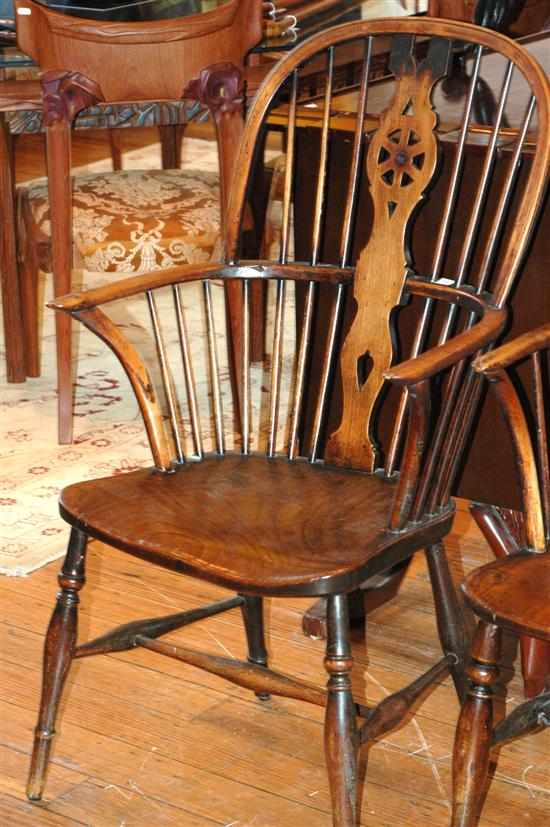 Appraisal: A PAIR OF TH CENTURY ELM WINDSOR ARMCHAIRS High backed