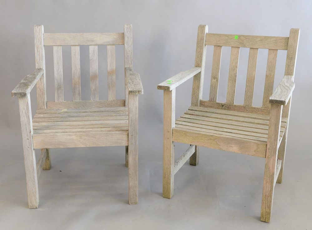 Appraisal: Pair Teak Outdoor Armchairs height inches Pair Teak Outdoor Armchairs