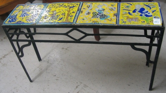 Appraisal: WROUGHT IRON AND PERSIAN TILE-TOP PIER TABLE The black iron